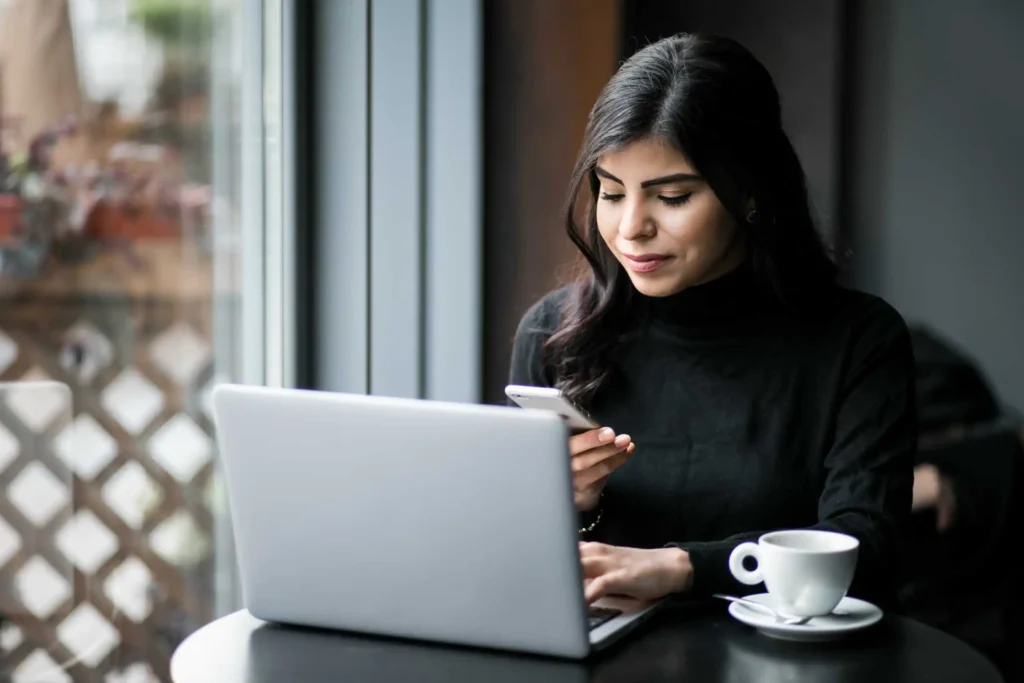 Brevity account manager working on a laptop